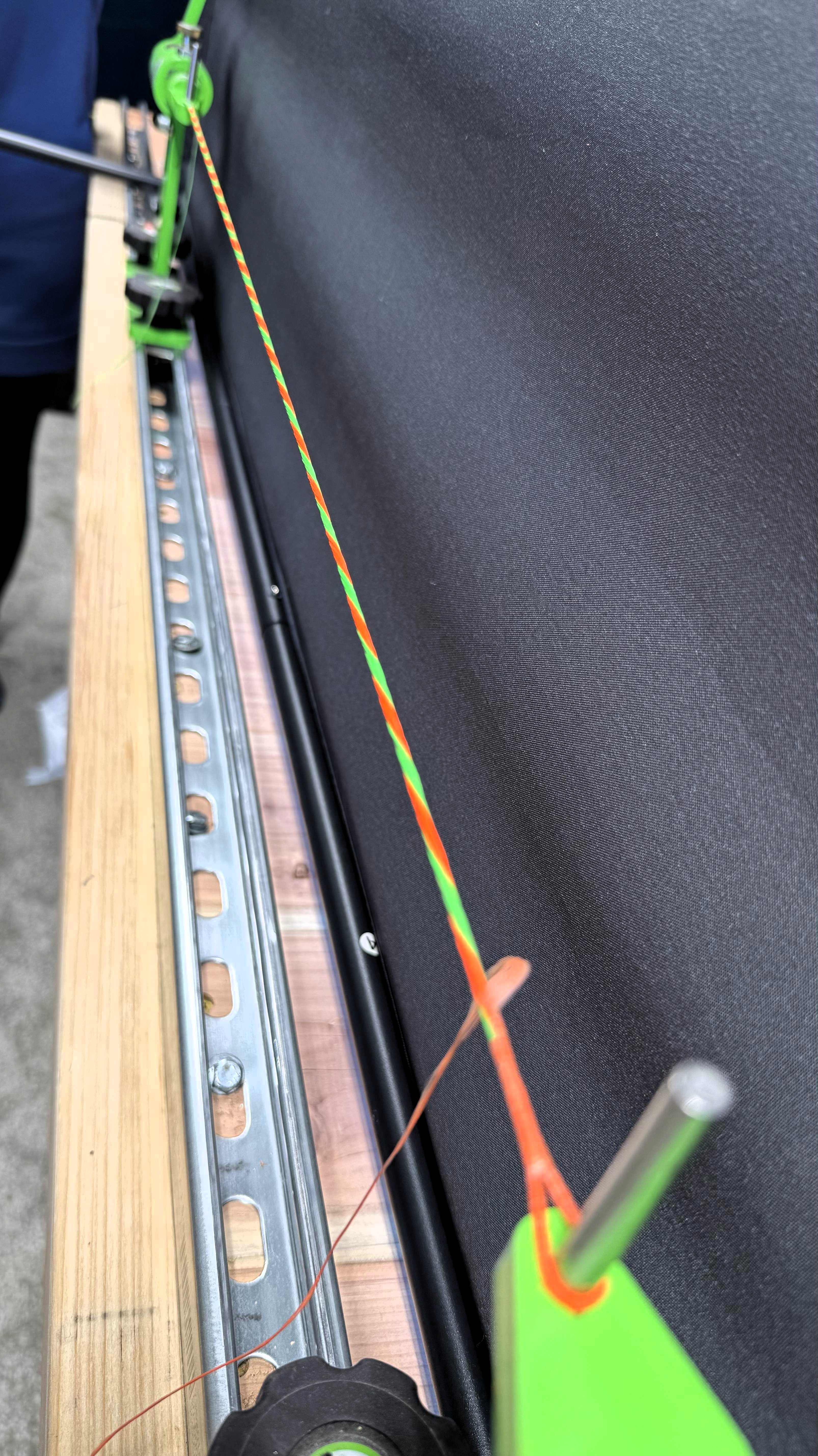 custom-made archery bowstring being made on a workbench