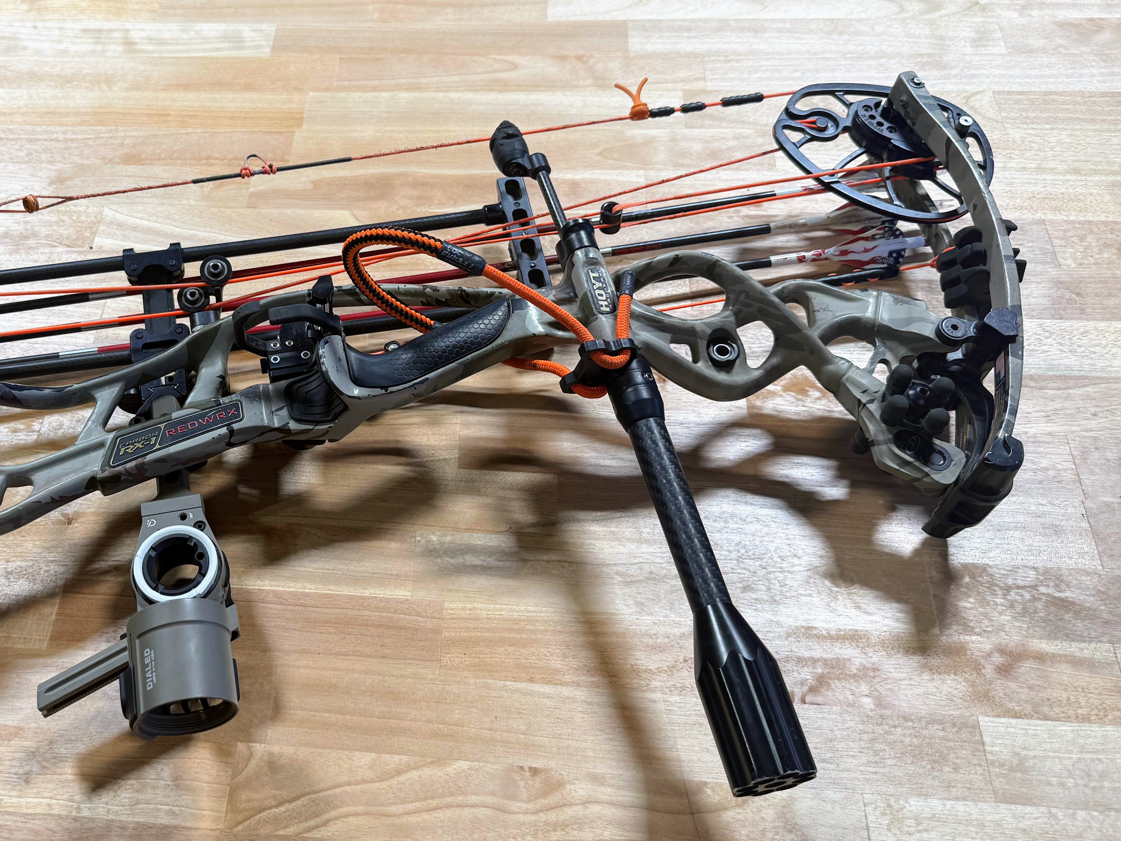 compound bow resting on a workbench